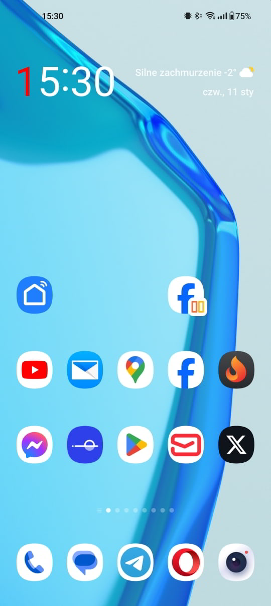 Ekran główny w systemie Android, gdzie trzeba wykonać gest ściągnięcia ikony.